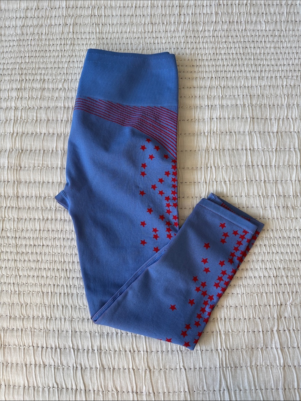 Fabletics Blue Leggings with Red Star Accent
